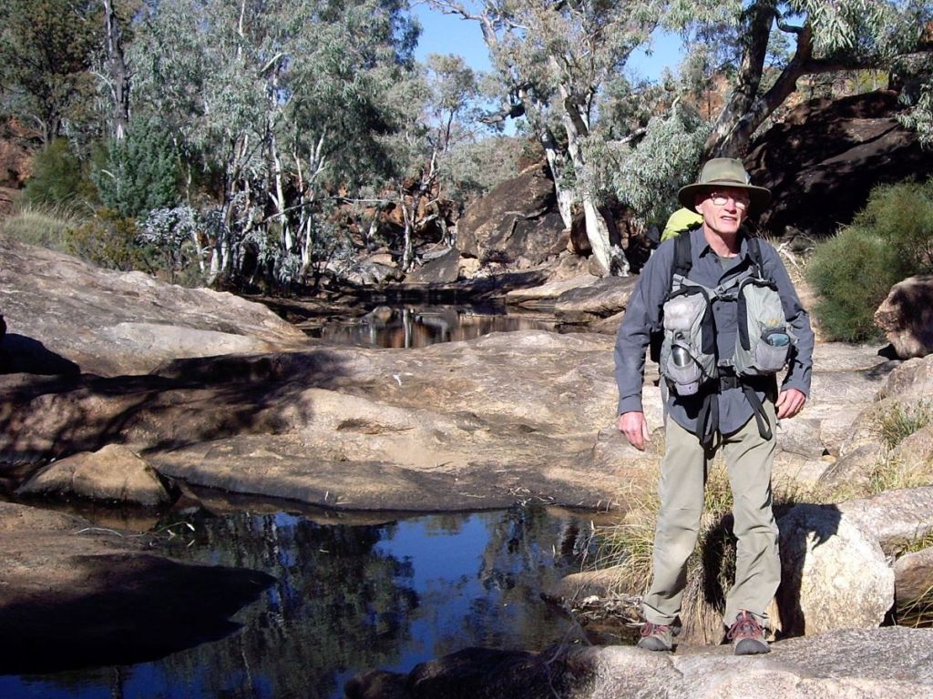 John wending his way over the granite pavement in Granite Plateau Creek. Mawson Plateau.