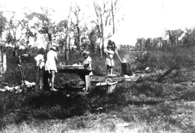 Waldron girls on wash day. Mt Moffatt Station.