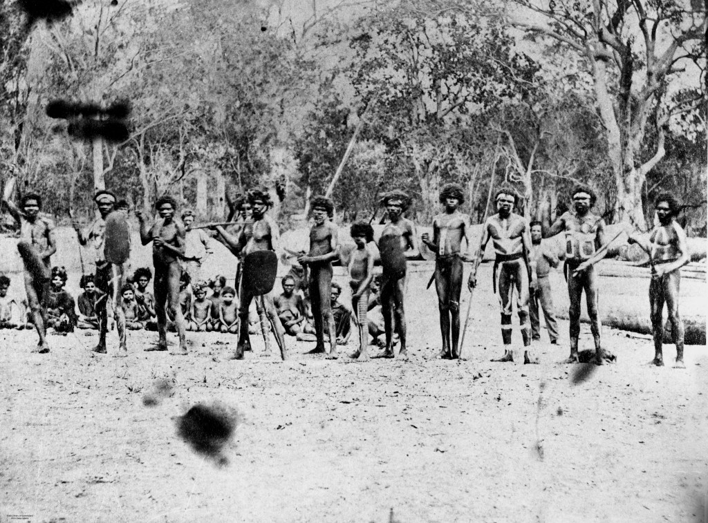 Decorated men with shields & spears 1870.